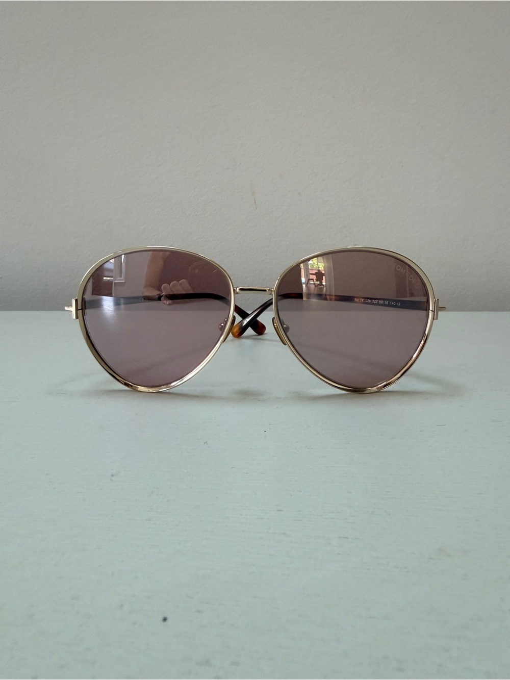 Tom Ford Gold Rimmed Reflective Sunglasses with Brown Gradient Lenses